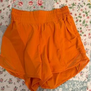 Lululemon Lit Orange hotty hots high rise 4”
